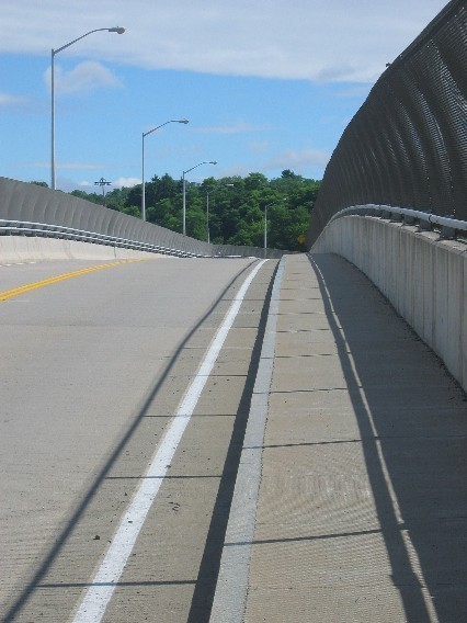 Looking east over the sidewalks on the south side of the Croton Point Avenue Bridge.
