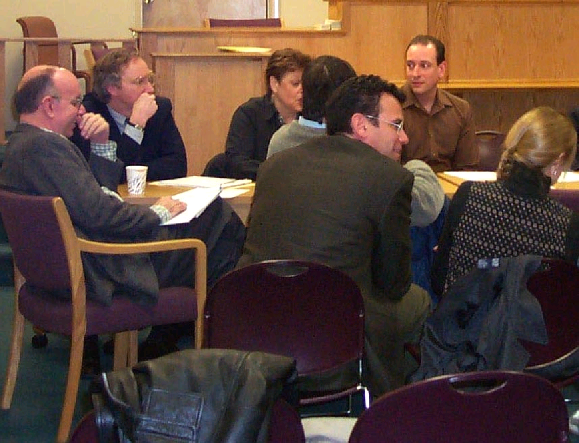 Photo of Meeting participants listening intently